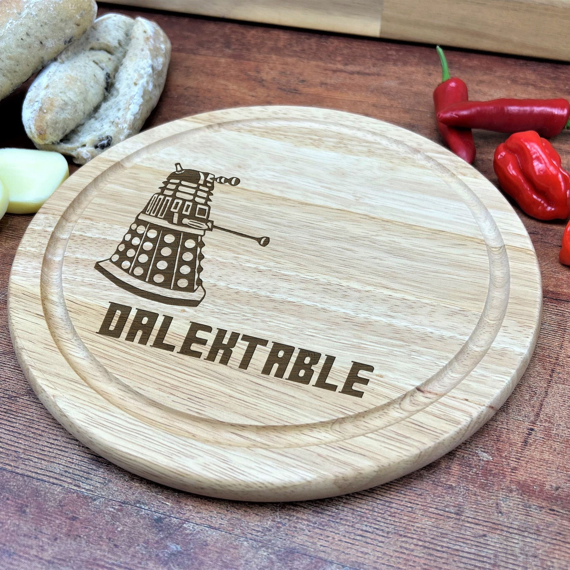 a wooden plate with a picture of a dalent on it