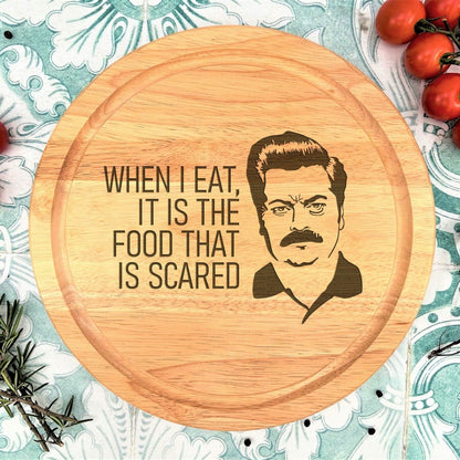 a cutting board with a picture of a man on it