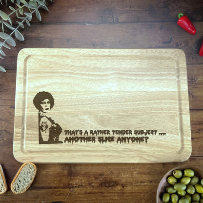 a wooden cutting board with a picture of a woman on it