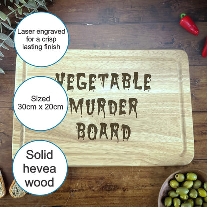 a wooden cutting board with a picture of a vegetable murder board