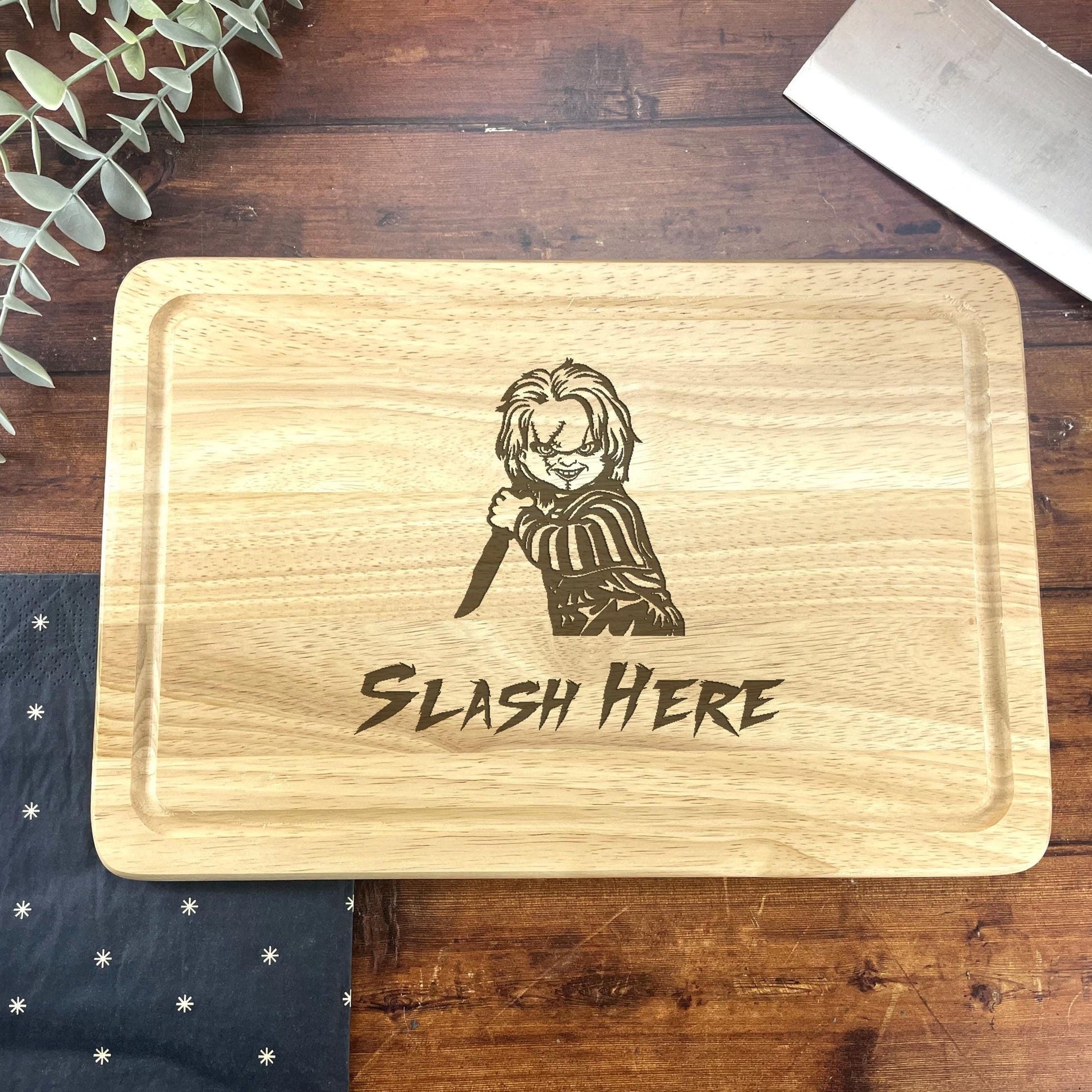 a wooden cutting board with a picture of a person on it