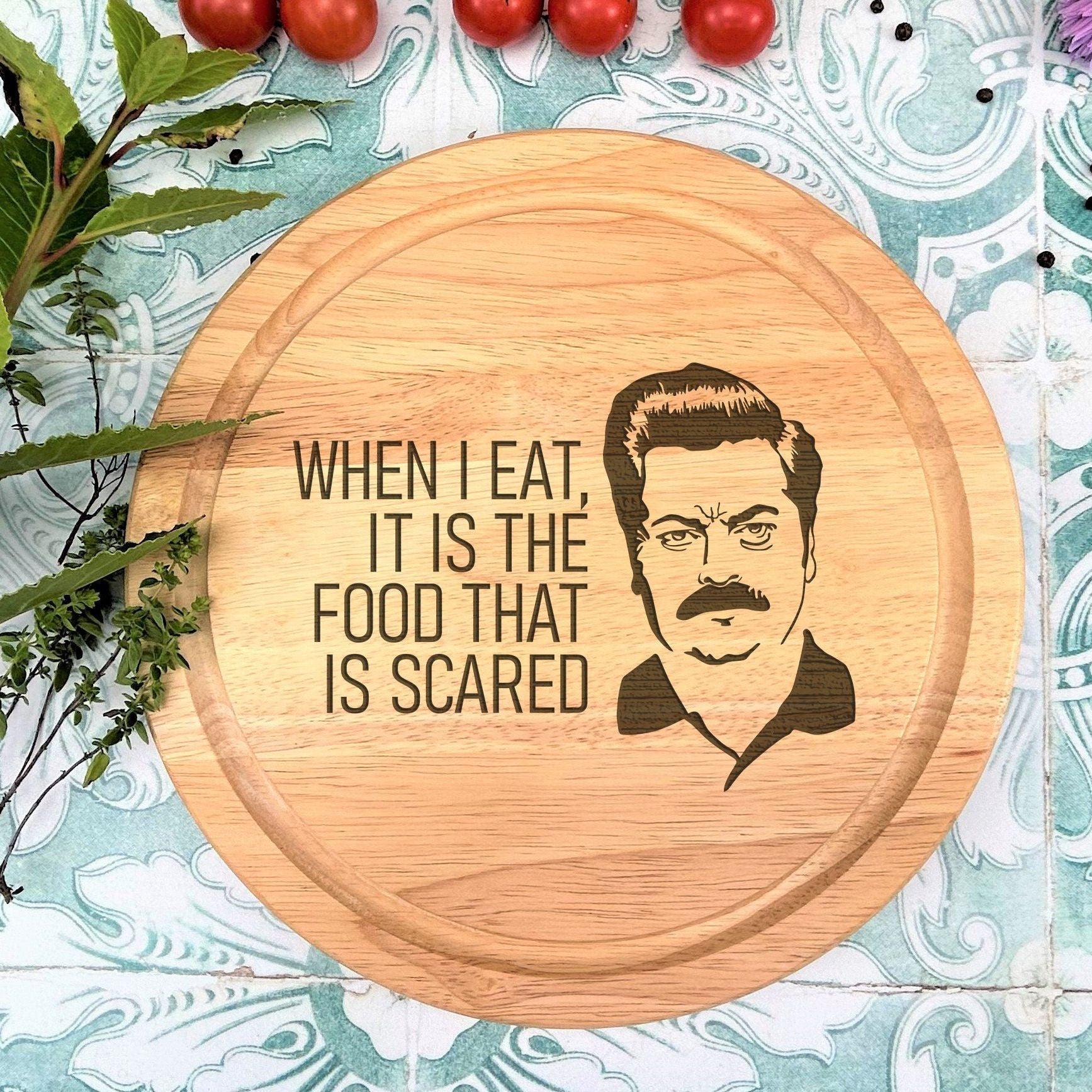 a cutting board with a picture of a man on it