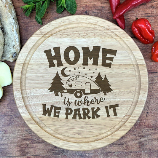 a wooden cutting board with a camper on it