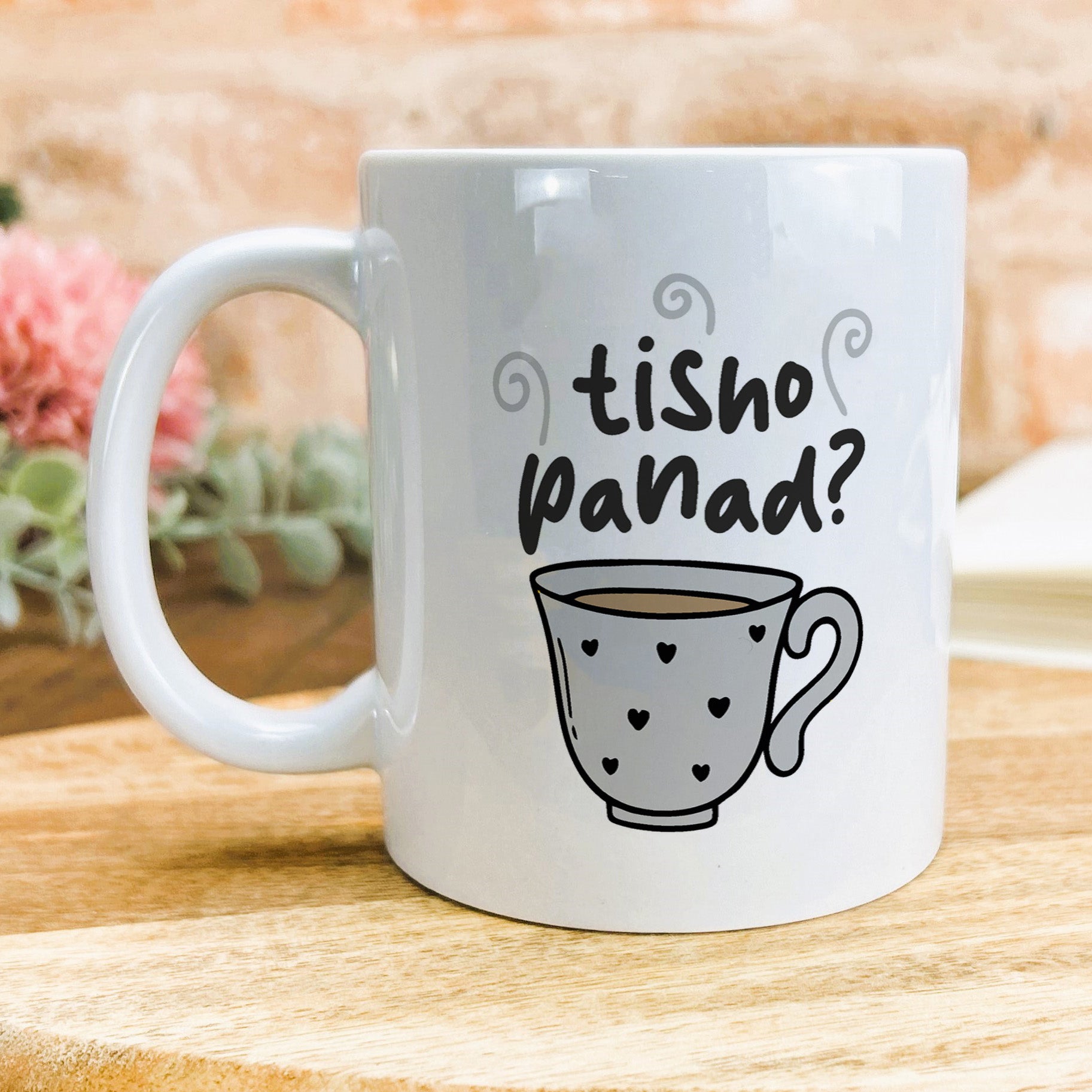 a white coffee mug with the words fish panda on it