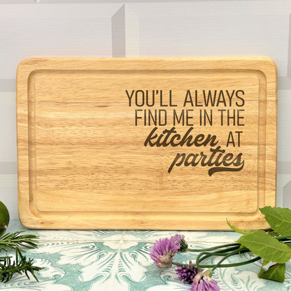 a wooden cutting board with the words you'll always find me in the kitchen