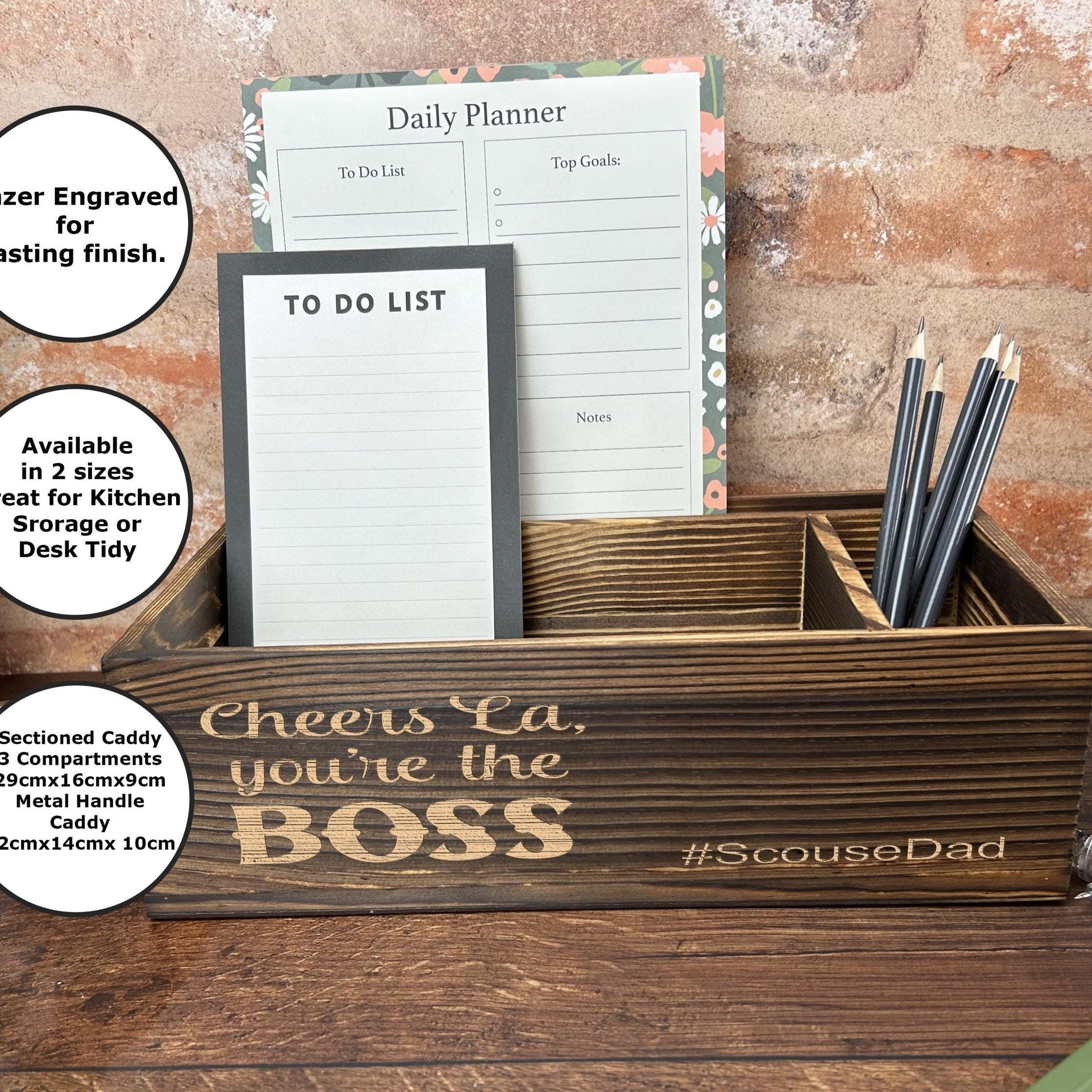 a desk with a notepad, pen holder, and notepad holder