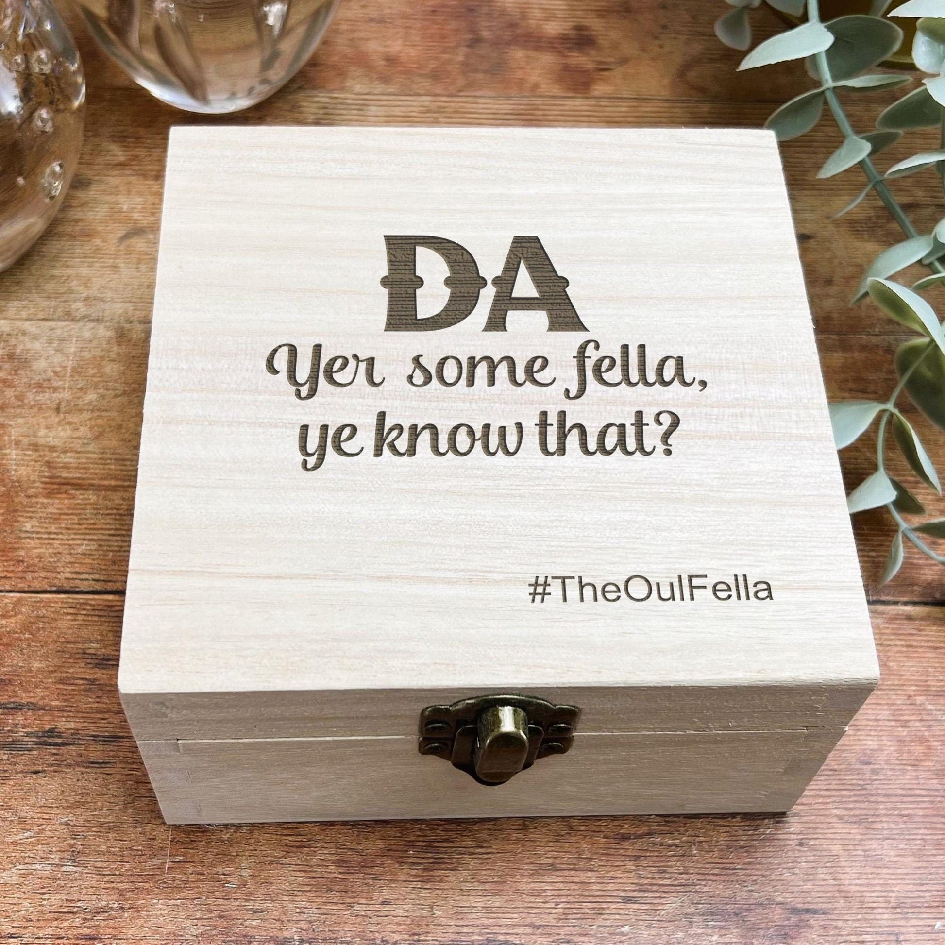 a wooden box with a quote on it