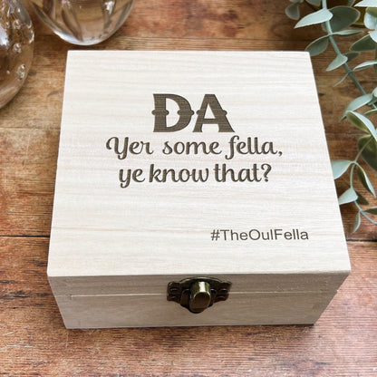 a wooden box with a quote on it