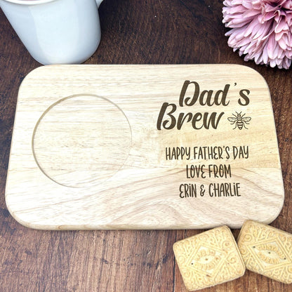 a wooden coaster that says dad's brew on it