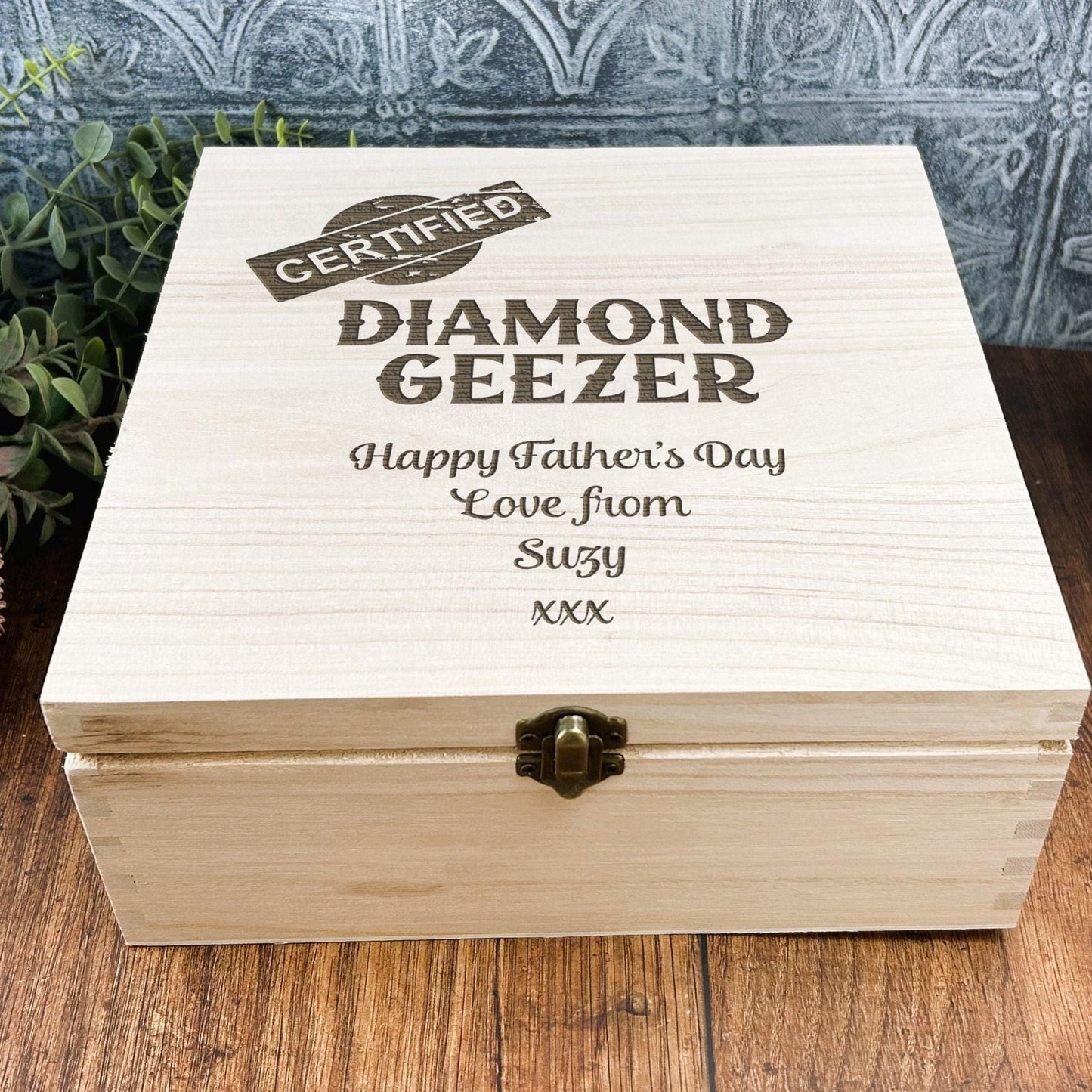 a wooden box sitting on top of a wooden table