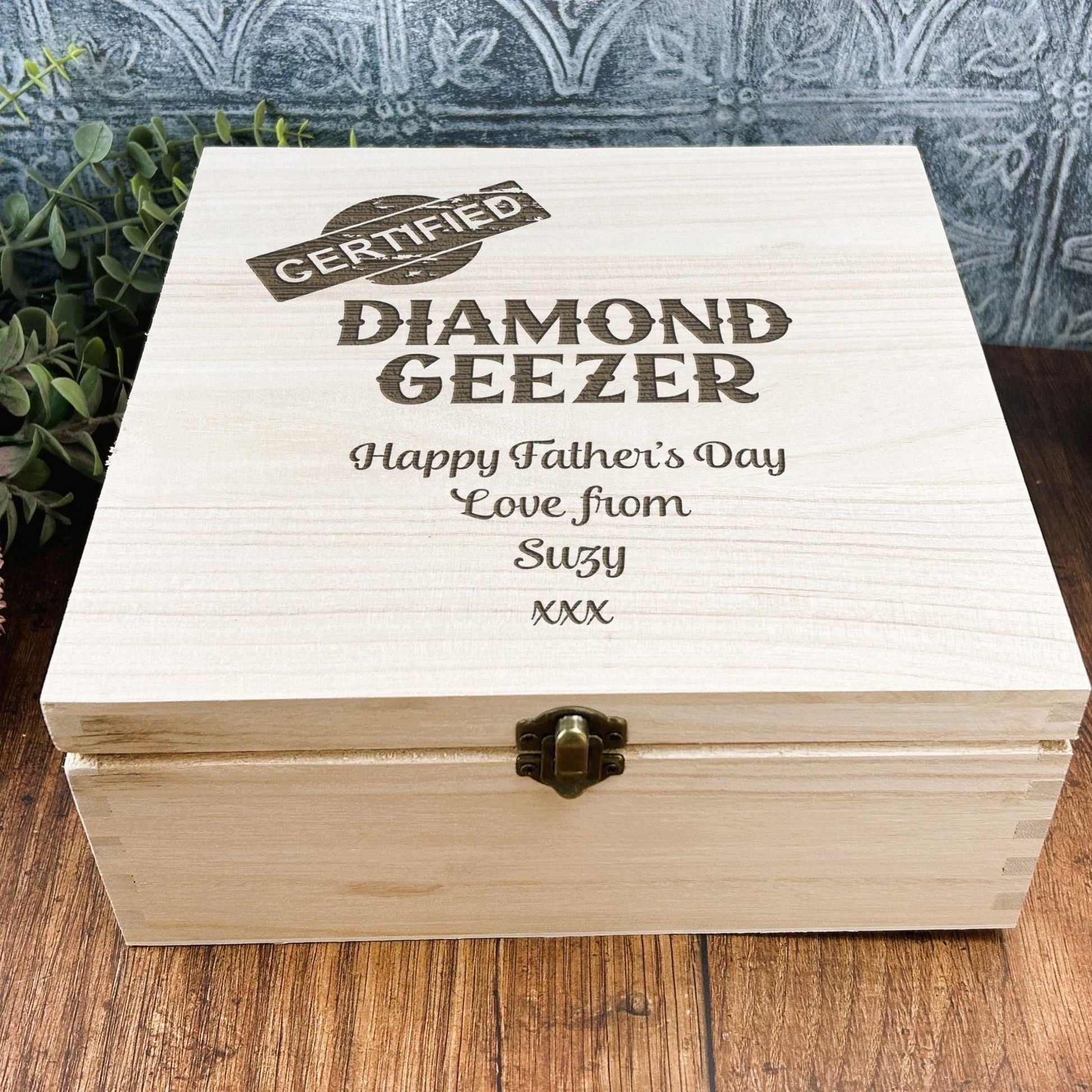 a wooden box sitting on top of a wooden table