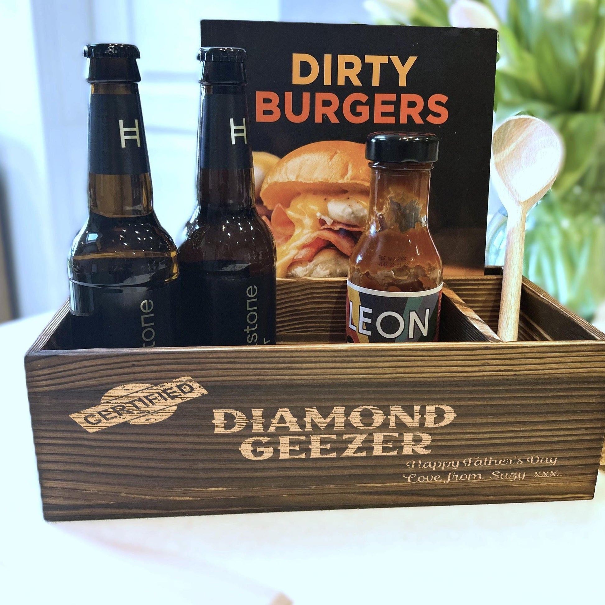 a wooden box filled with bottles of beer