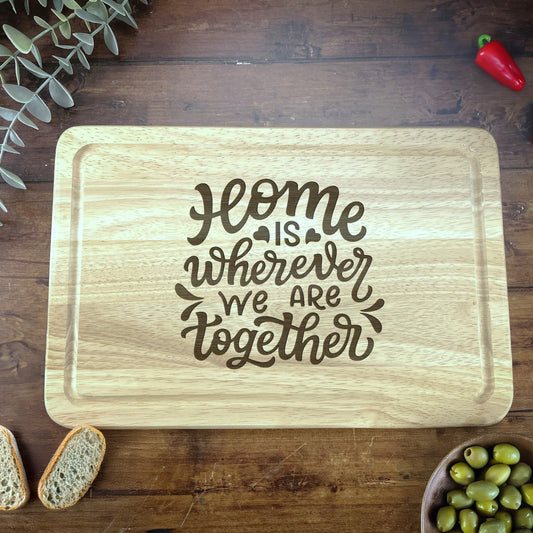a wooden cutting board with a quote on it