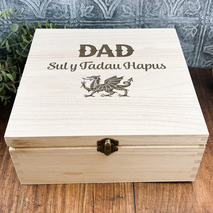 a wooden box sitting on top of a wooden table