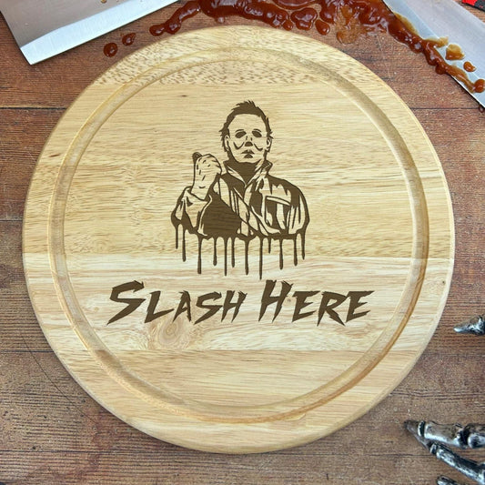 a wooden cutting board with a picture of a man on it