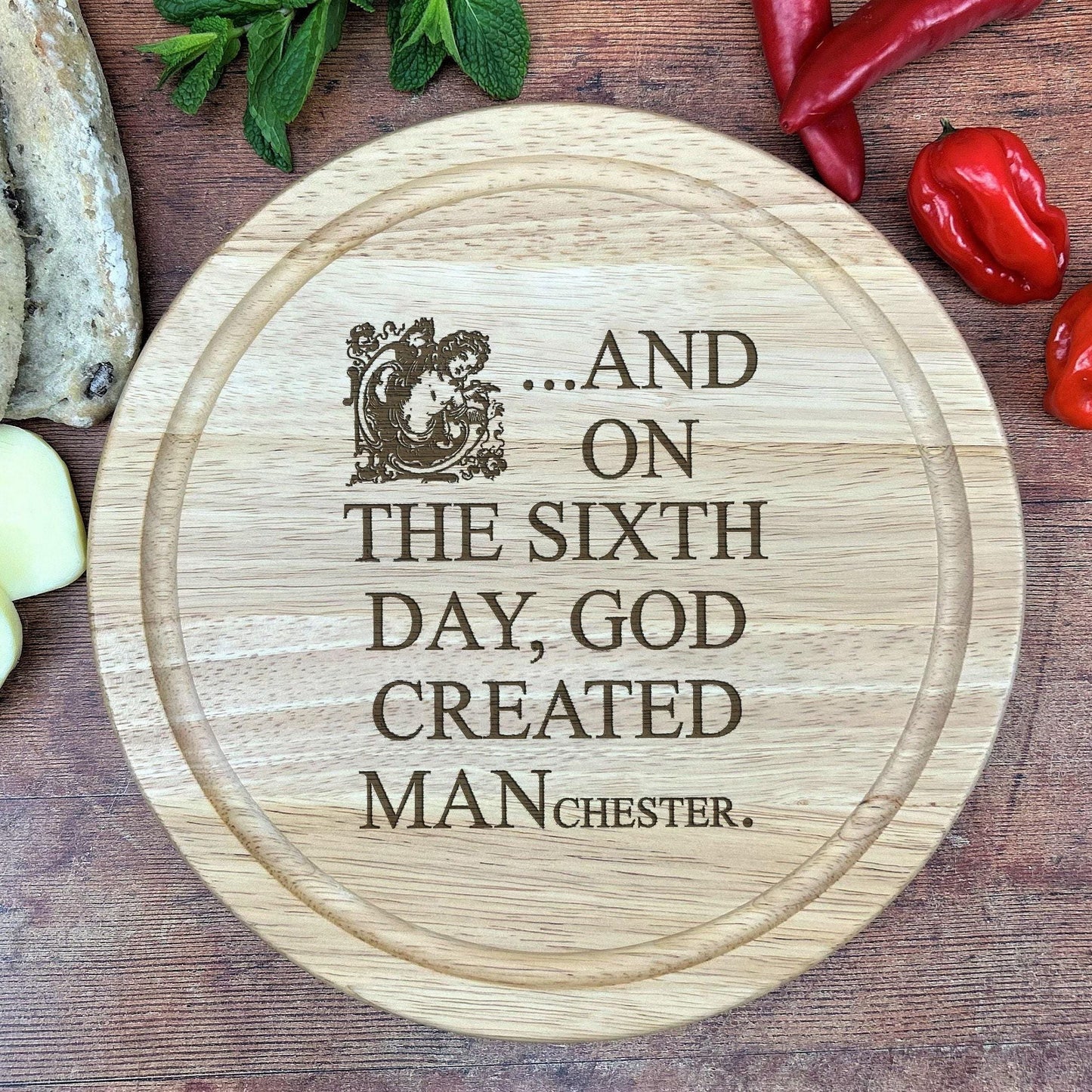 And On The Sixth Day God Created MANchester - Engraved Wooden Chopping Board