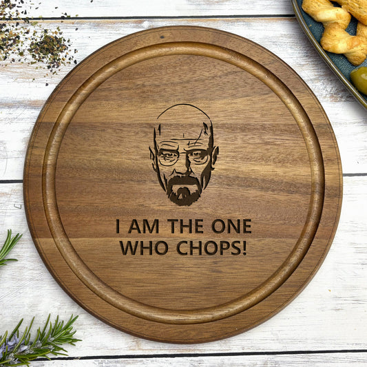 a wooden plate with a picture of a bearded man on it