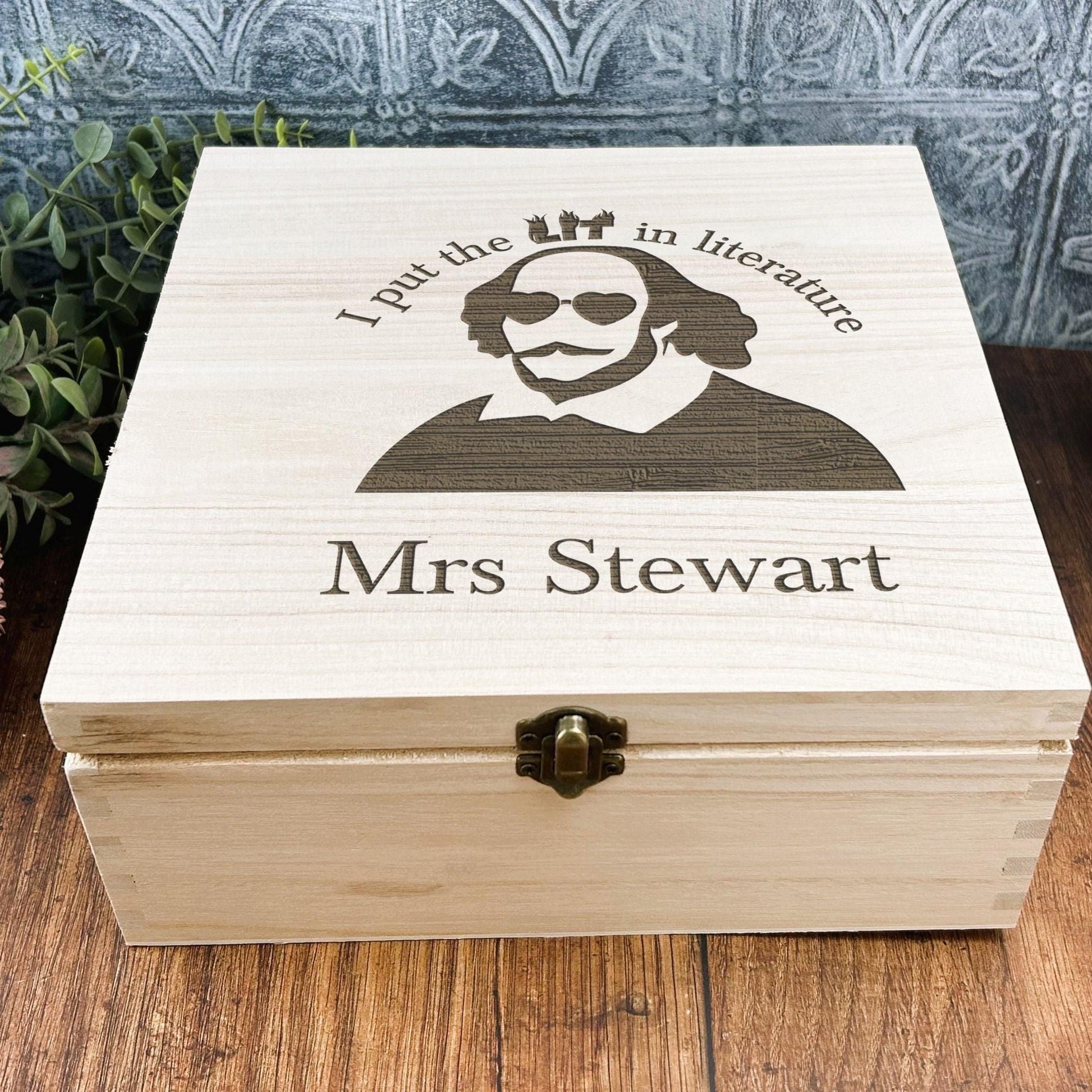 a wooden box sitting on top of a wooden table