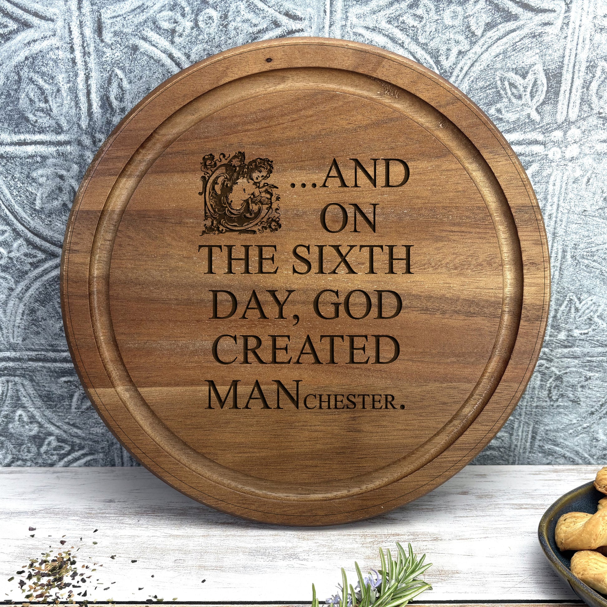 a wooden sign that says and on the sixth day, god created man