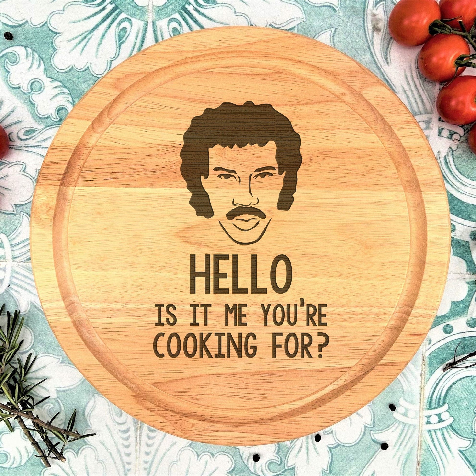 a wooden cutting board with a picture of a man on it