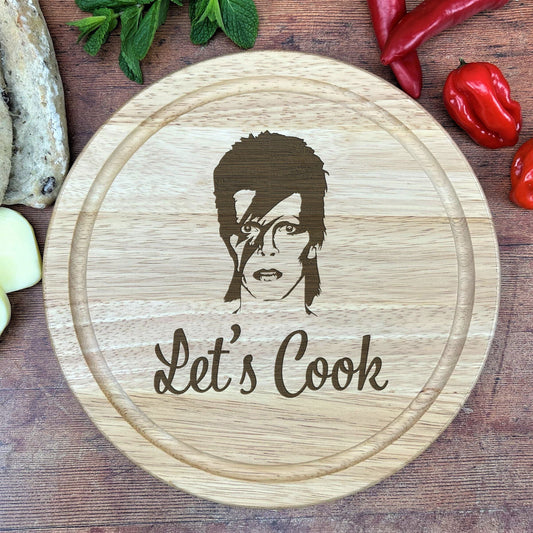 a wooden cutting board with a picture of a man on it