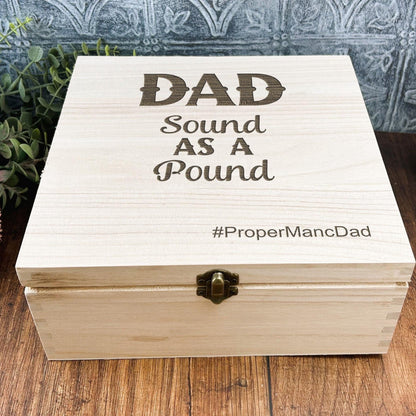 a wooden box sitting on top of a wooden table