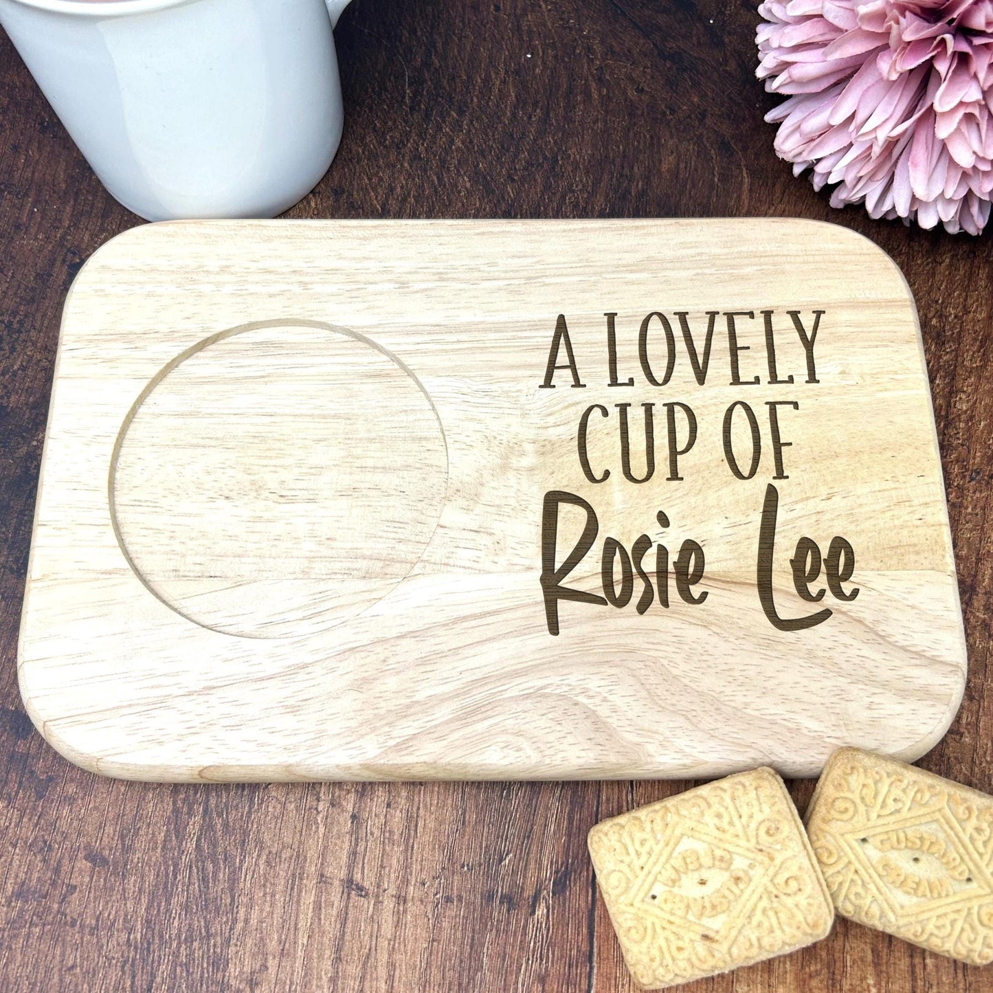 a wooden coaster that says a lovely cup of rose ice