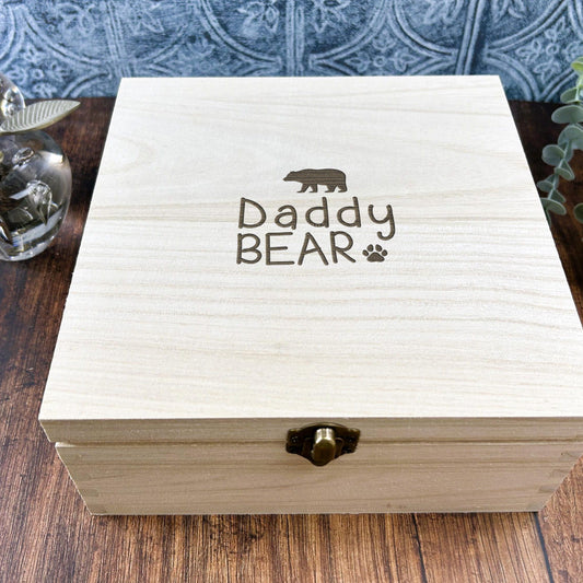 a wooden box sitting on top of a wooden table