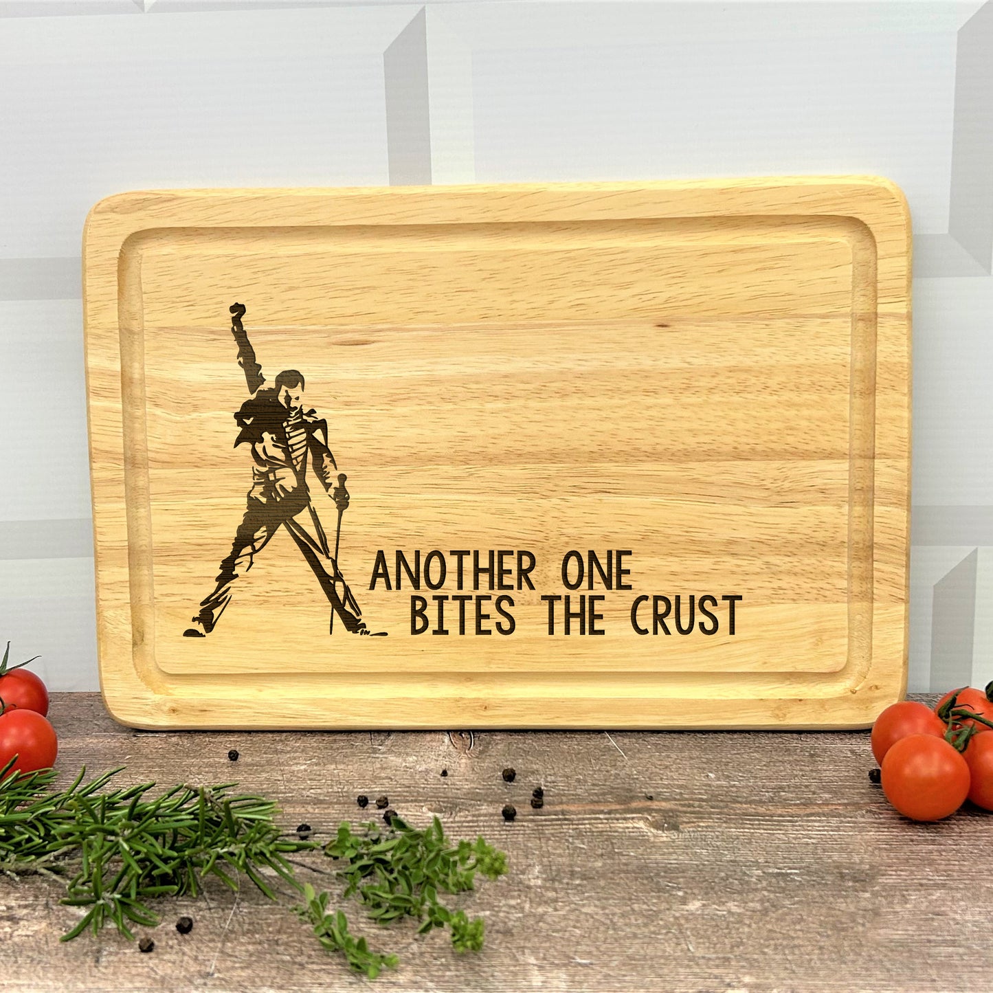a cutting board with a picture of a man holding a sword
