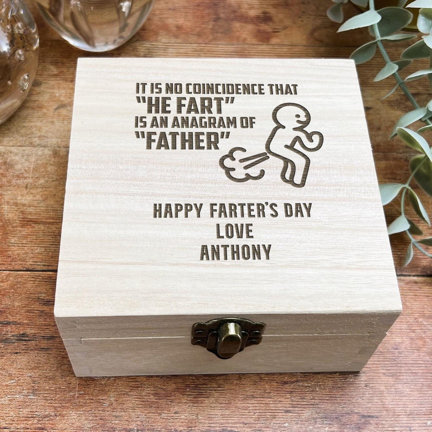a wooden box with a picture of a man on it