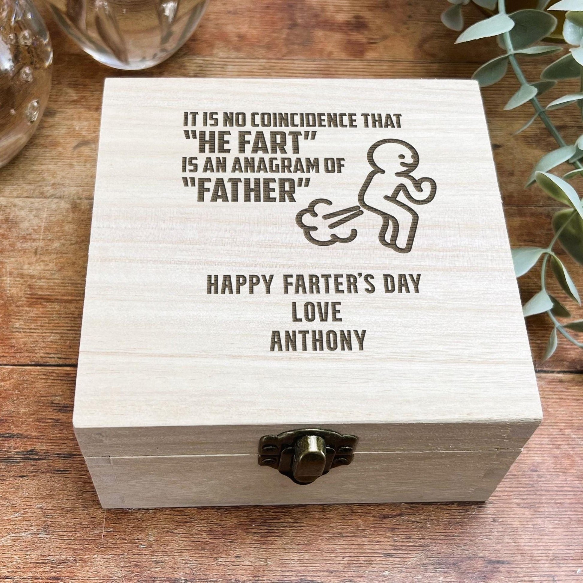 a wooden box with a picture of a man on it