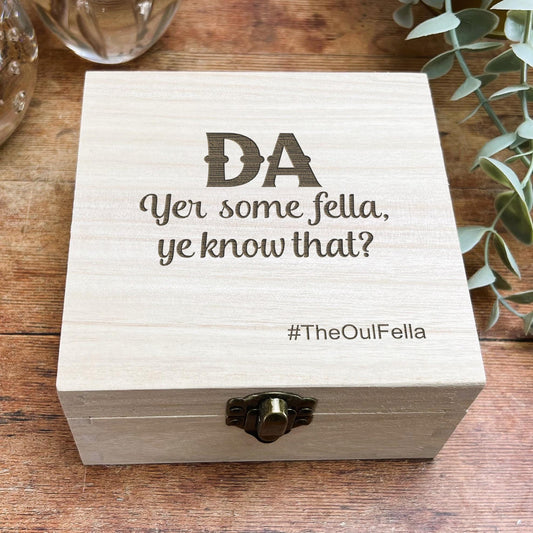 a wooden box with a quote on it