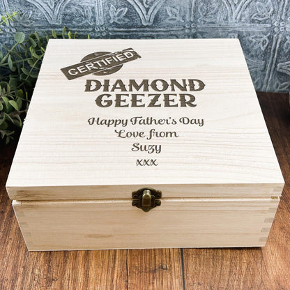 a wooden box sitting on top of a wooden table