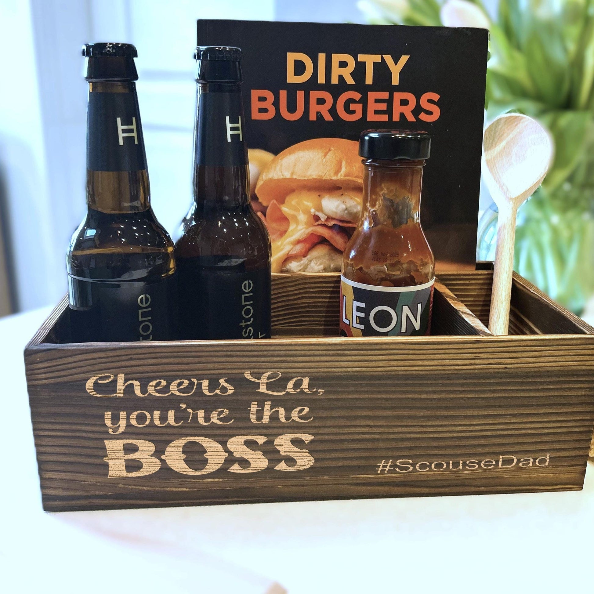 a wooden box filled with bottles of beer