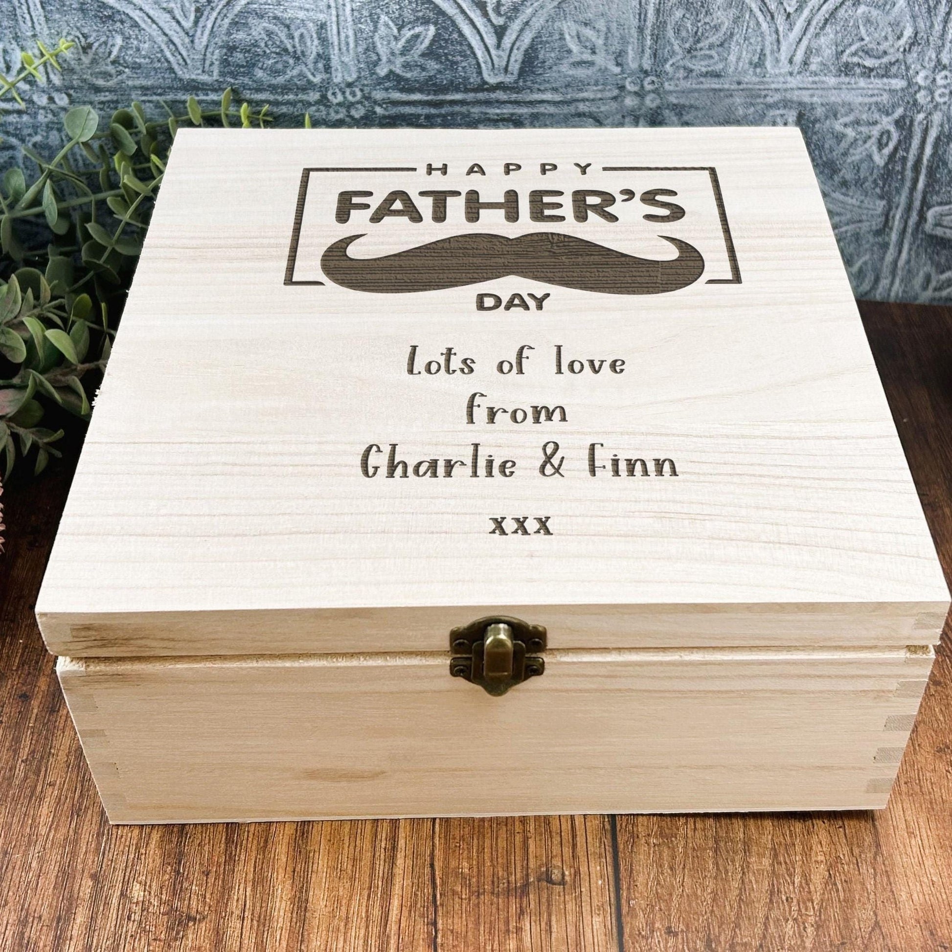 a wooden box sitting on top of a wooden table