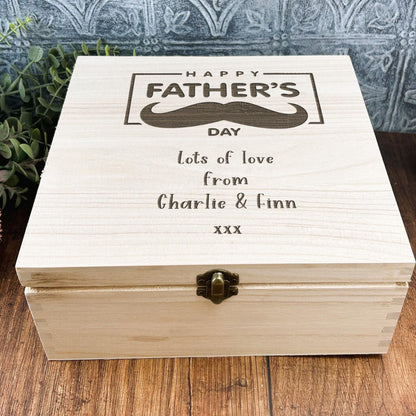 a wooden box sitting on top of a wooden table