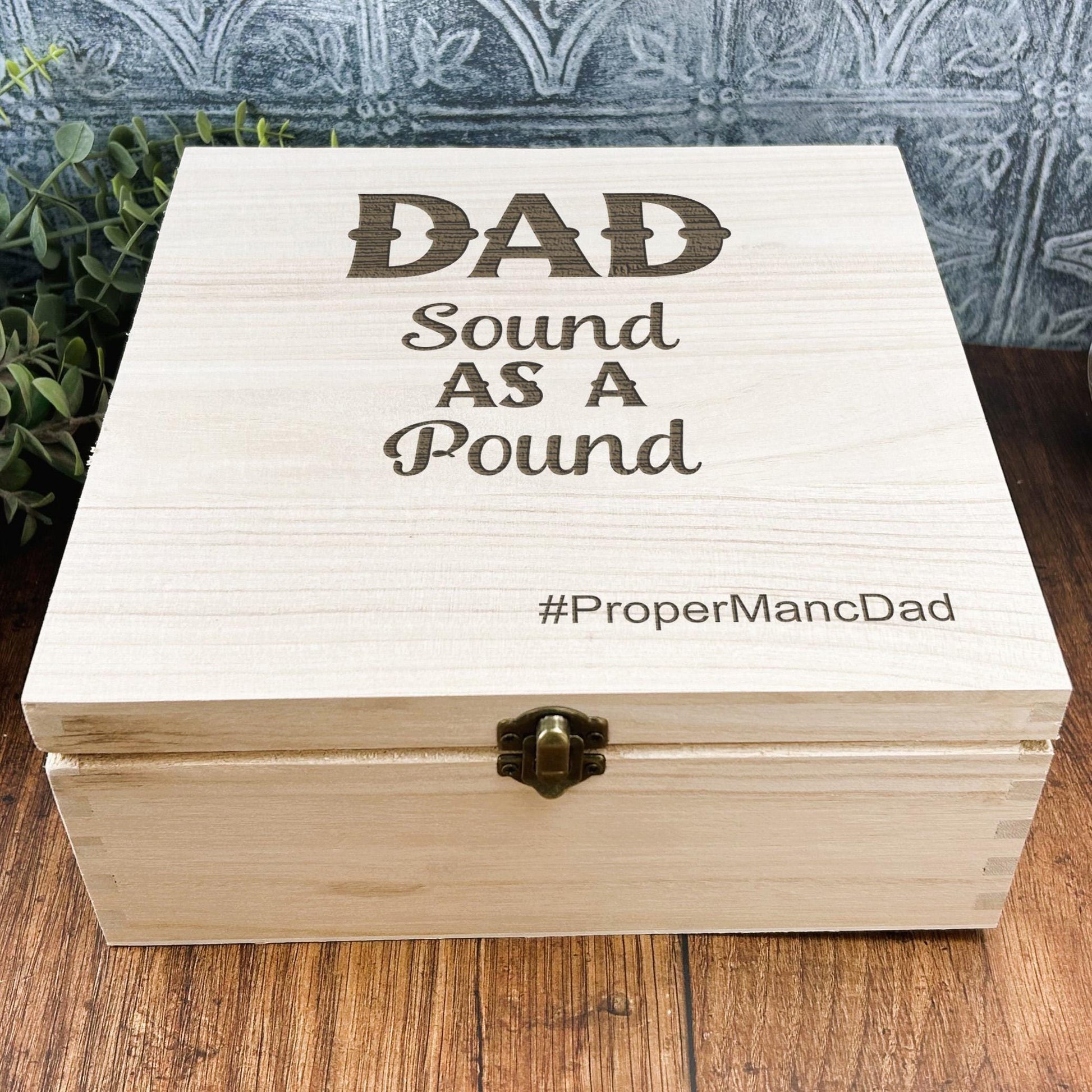 a wooden box that says dad sound as a pound