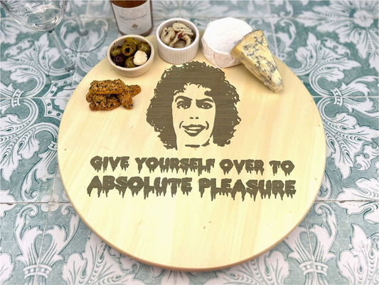 a wooden plate with a picture of a person on it