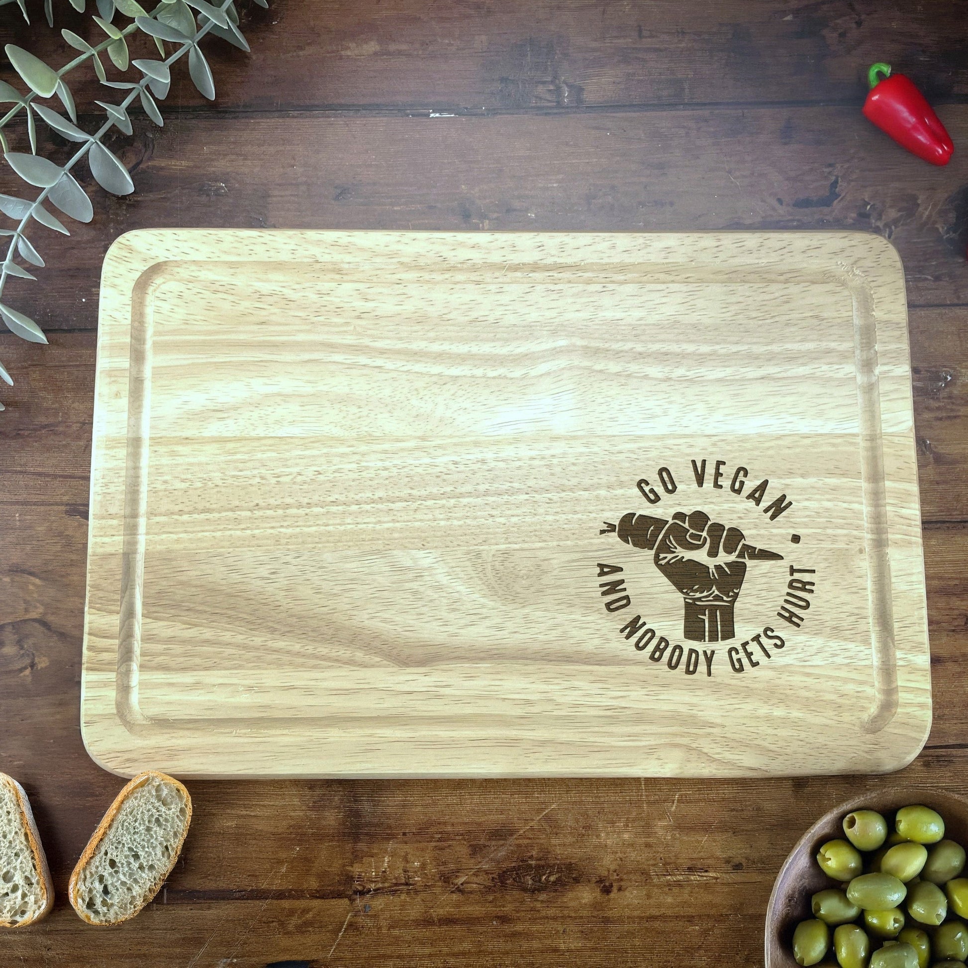 a wooden cutting board with a logo on it
