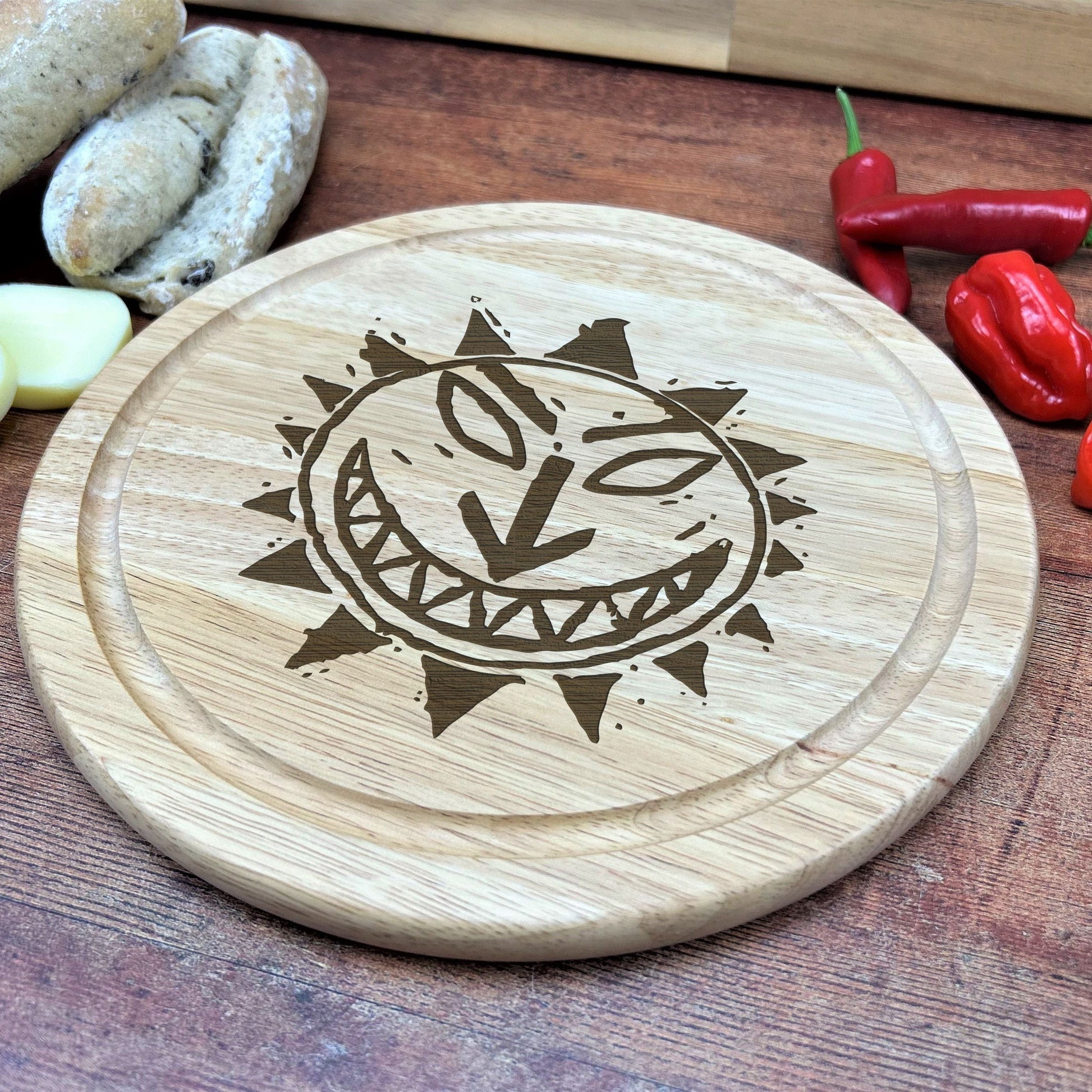 a wooden cutting board with a design on it