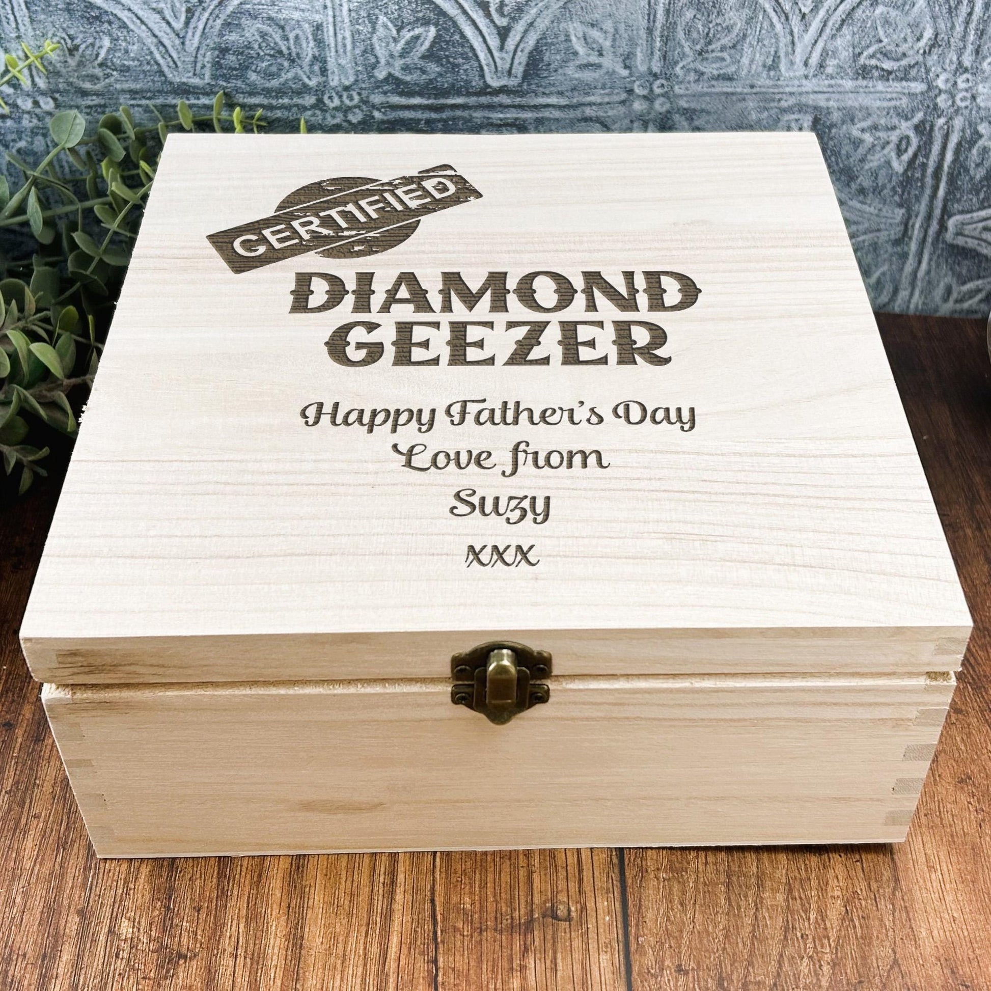 a wooden box sitting on top of a wooden table