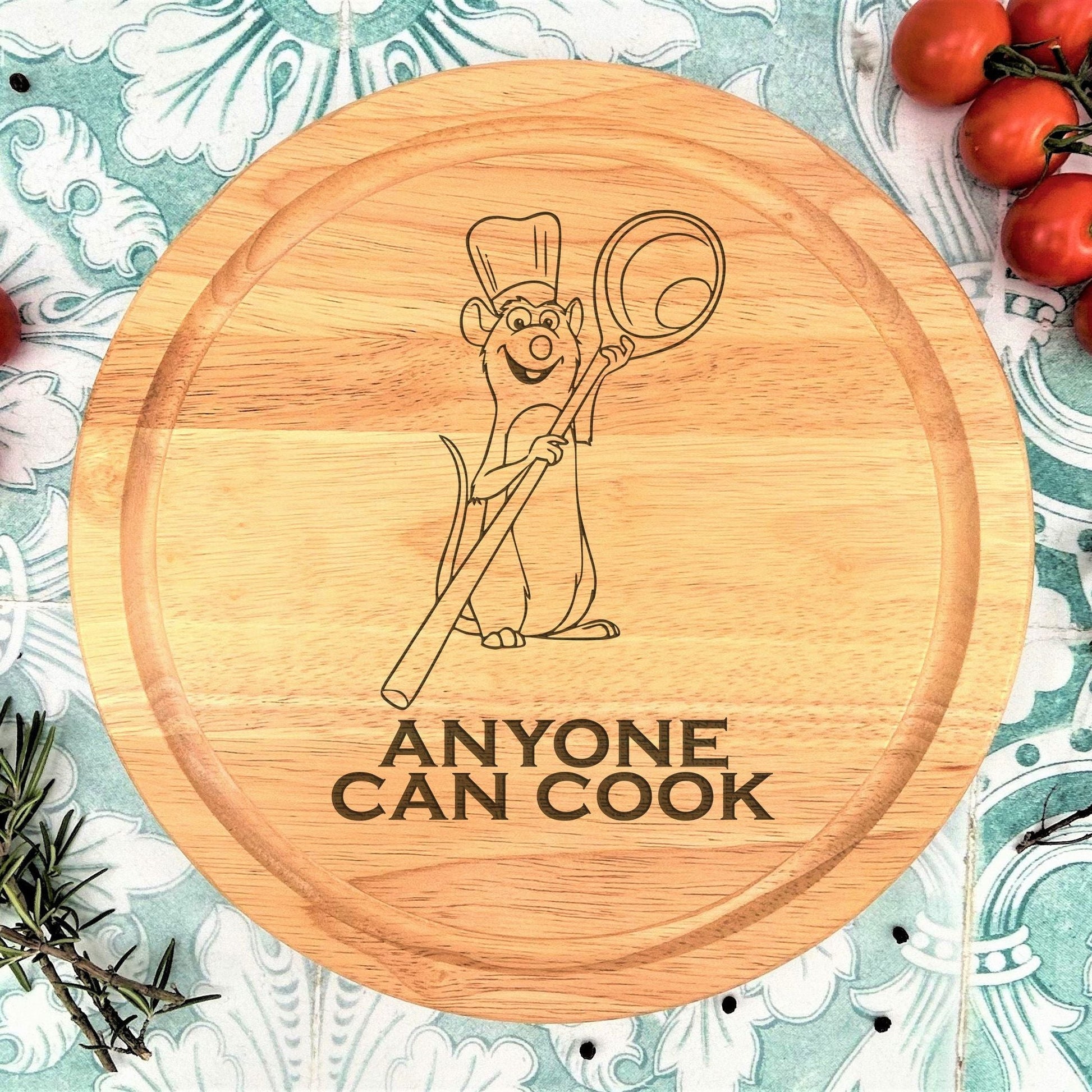a wooden cutting board with an image of a chef on it