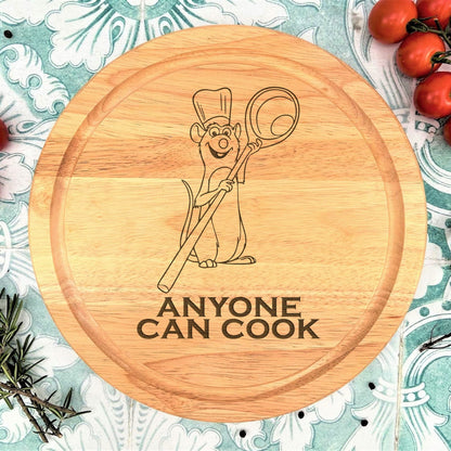 a wooden cutting board with an image of a chef on it