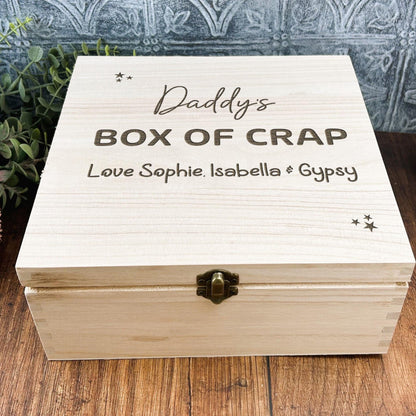 a wooden box with the words daddy's box of crap on it