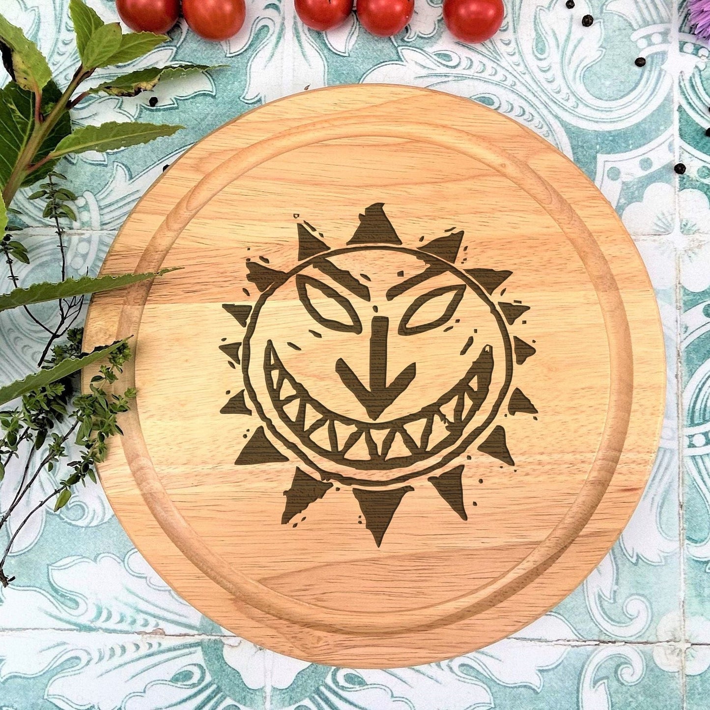 a wooden cutting board with a design on it