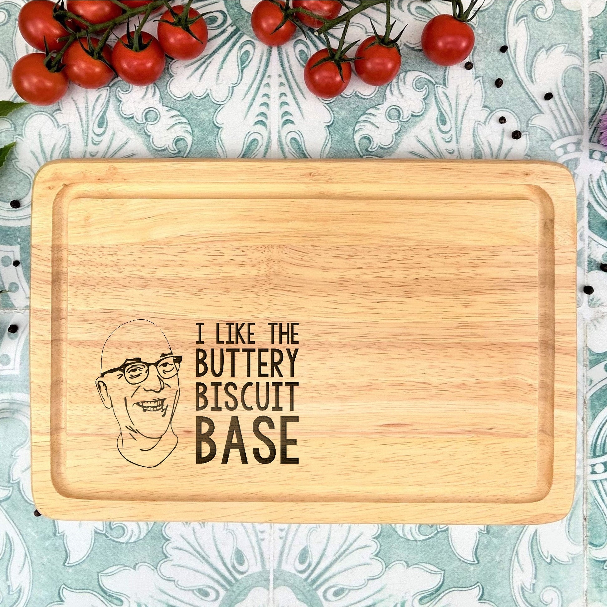 a cutting board with a picture of a man and tomatoes on it