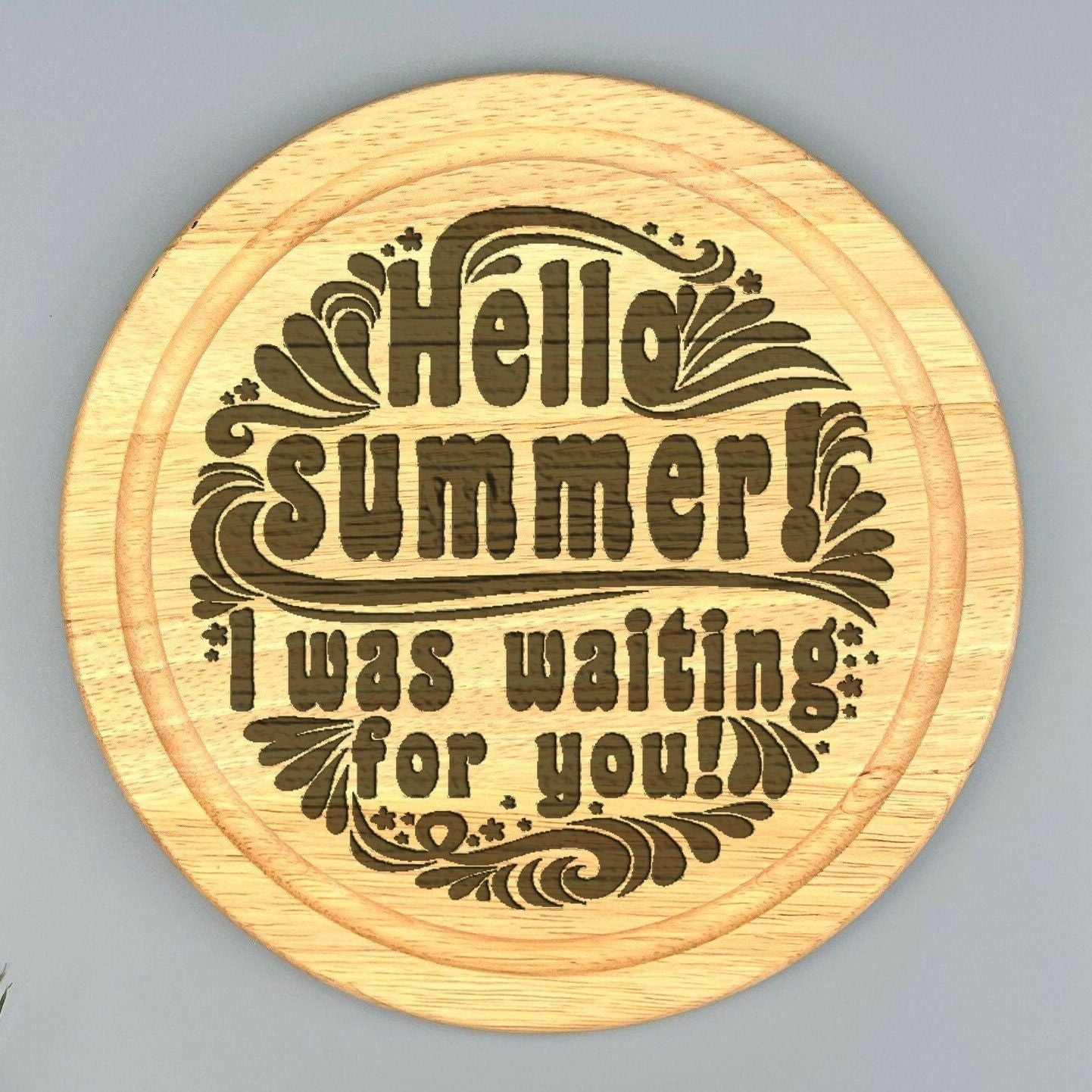 A wooden coaster with a decorative design featuring the text "Hello summer! I was waiting for you!"