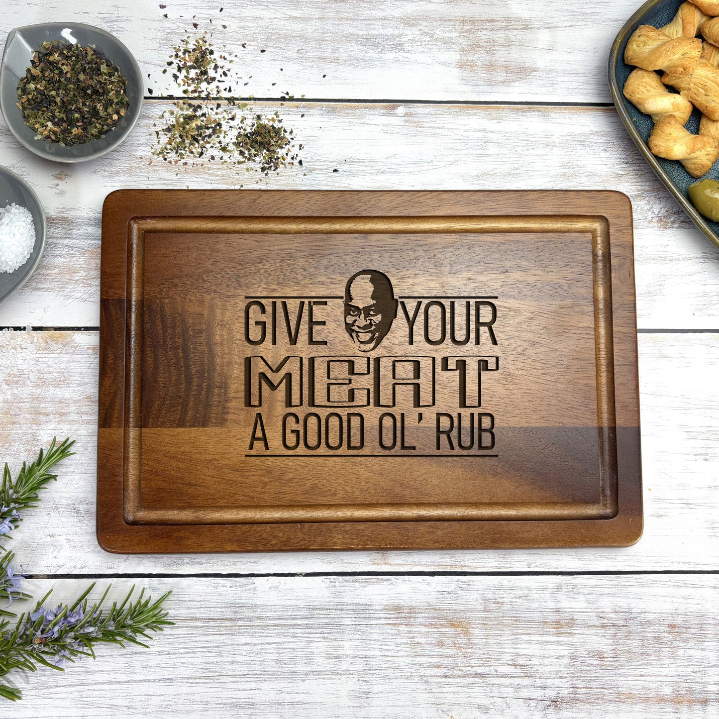 a wooden cutting board with a quote on it