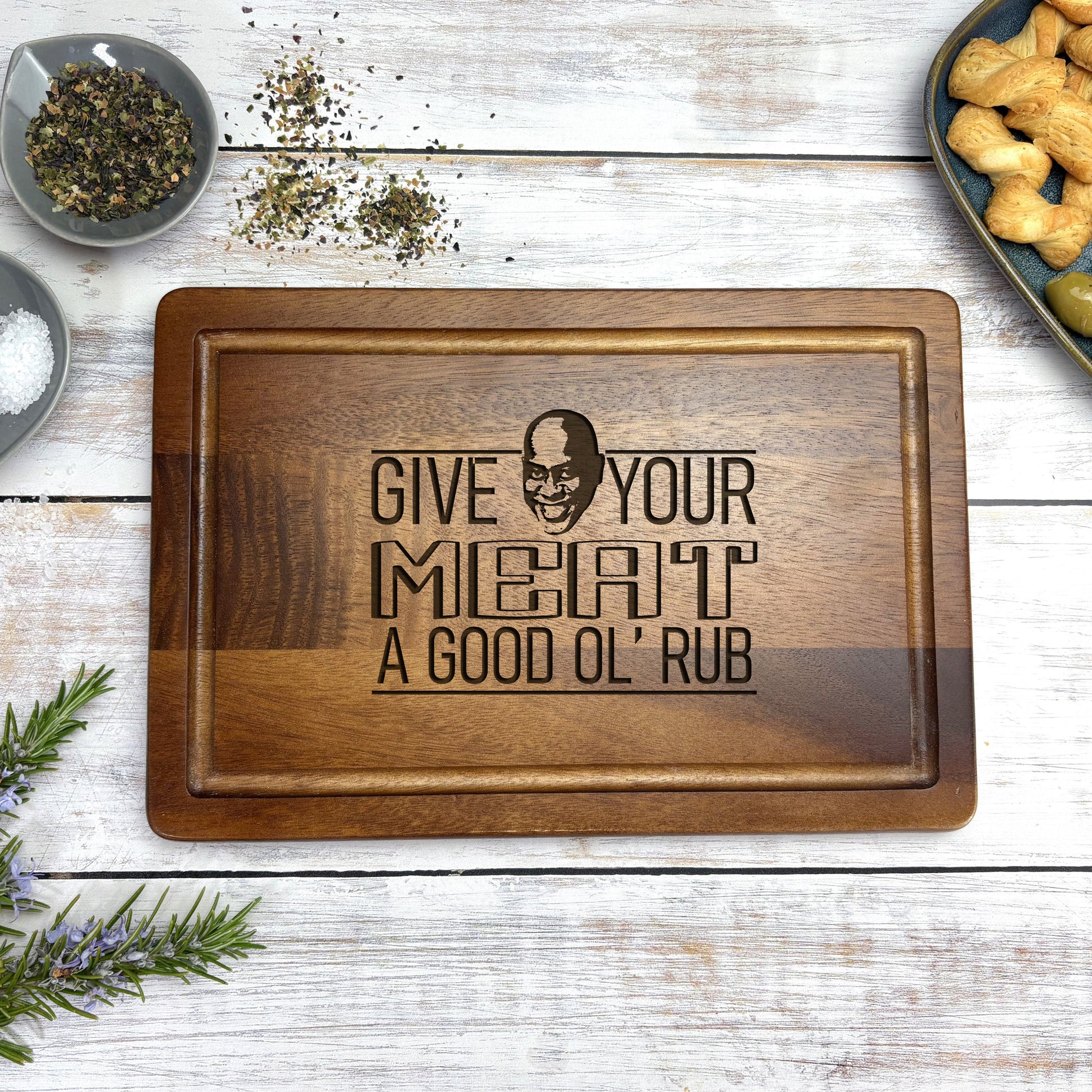 a wooden cutting board with a quote on it