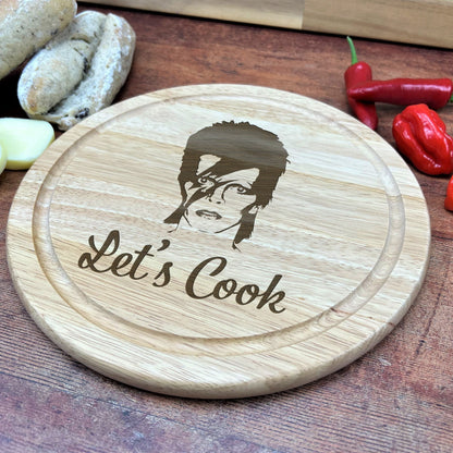 a wooden cutting board with a picture of a man on it